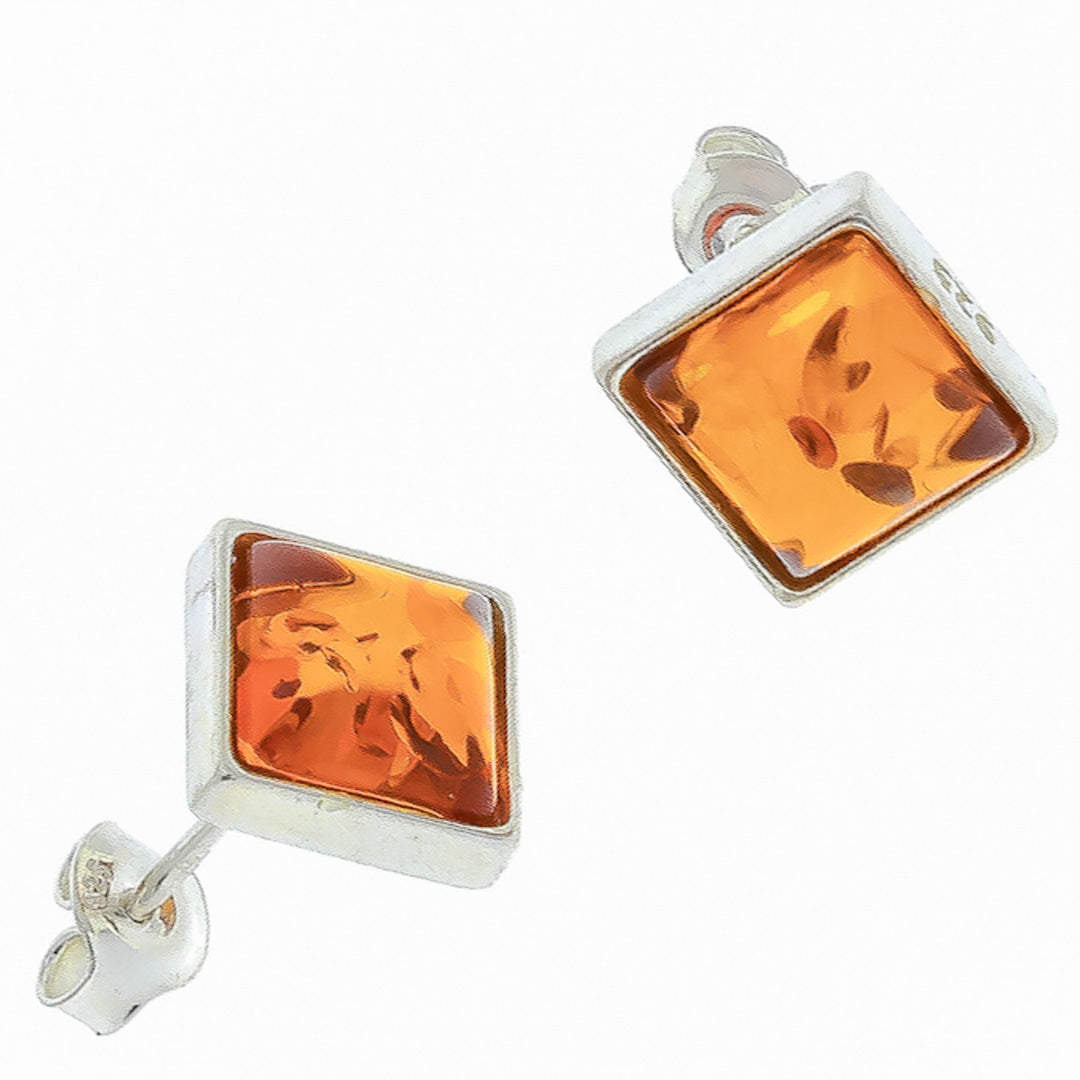 Quadratische Ohrstecker aus Sterlingsilber mit transparenten honigbraunen Bernsteinplättchen