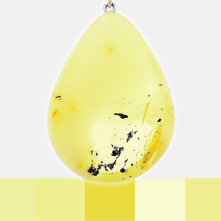 Pastelguld vedhæng lavet af ægte rav