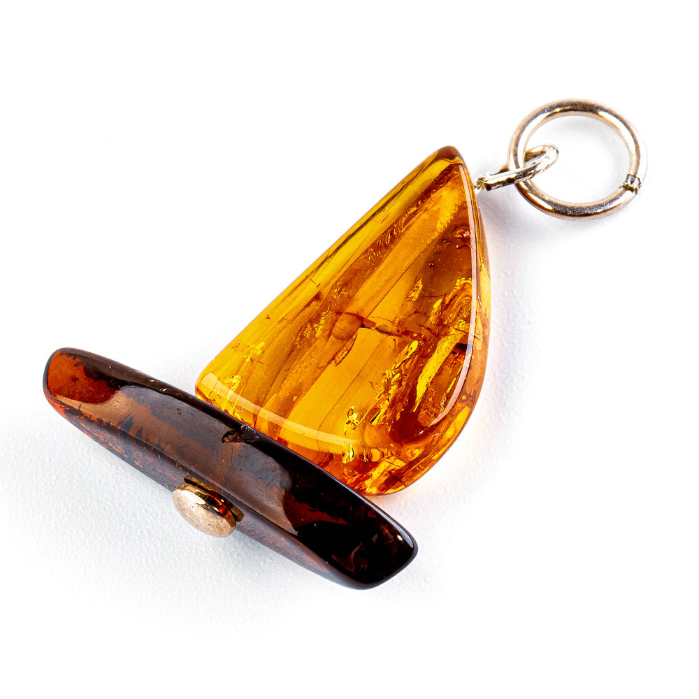 Amber sailboat pendant