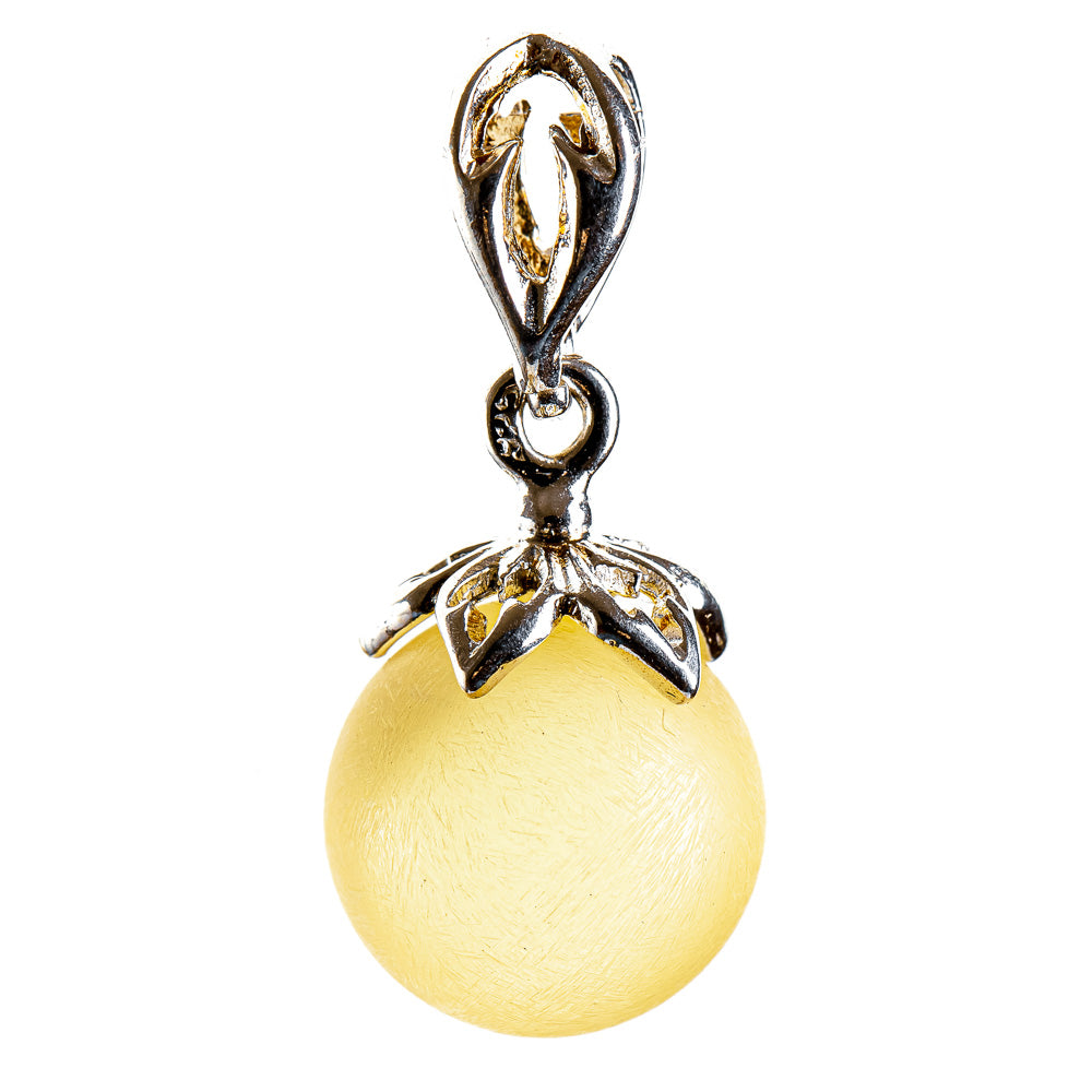 Stylish, classic elegance made from a perfect amber ball in white yellow on a sterling silver setting