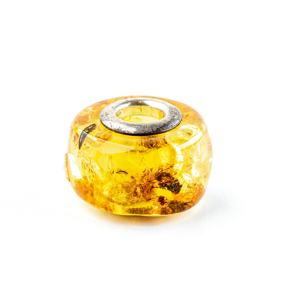 Pendant - Charm made of amber in lighter honey-gold tones