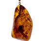 Chunky and stylish pendant made from highly polished amber nugget