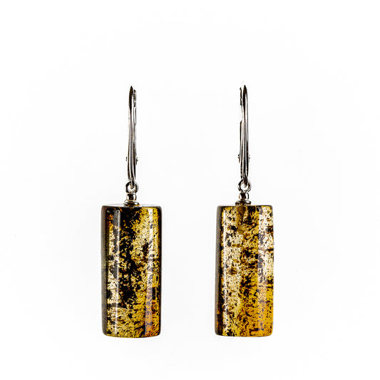 Earrings made of natural Nordic amber in the form of alloys.