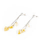 Earrings (chains) each with three hearts made of natural Nordic amber, in the colors buttermilk to ivory