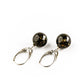 Earrings made of spherical natural Nordic amber