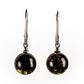 Earrings made of spherical natural Nordic amber