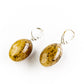 Egg-shaped premium amber earrings, creamy