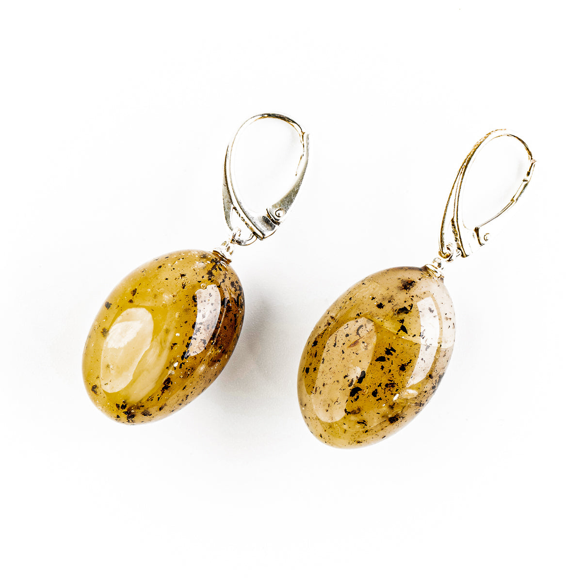 Egg-shaped premium amber earrings, creamy