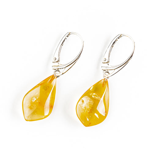 Light gold colored drop earrings made of natural Nordic amber