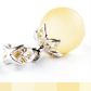 Stylish, classic elegance made from a perfect amber ball in white yellow on a sterling silver setting