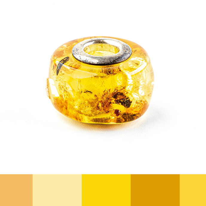 Pendant - Charm made of amber in lighter honey-gold tones