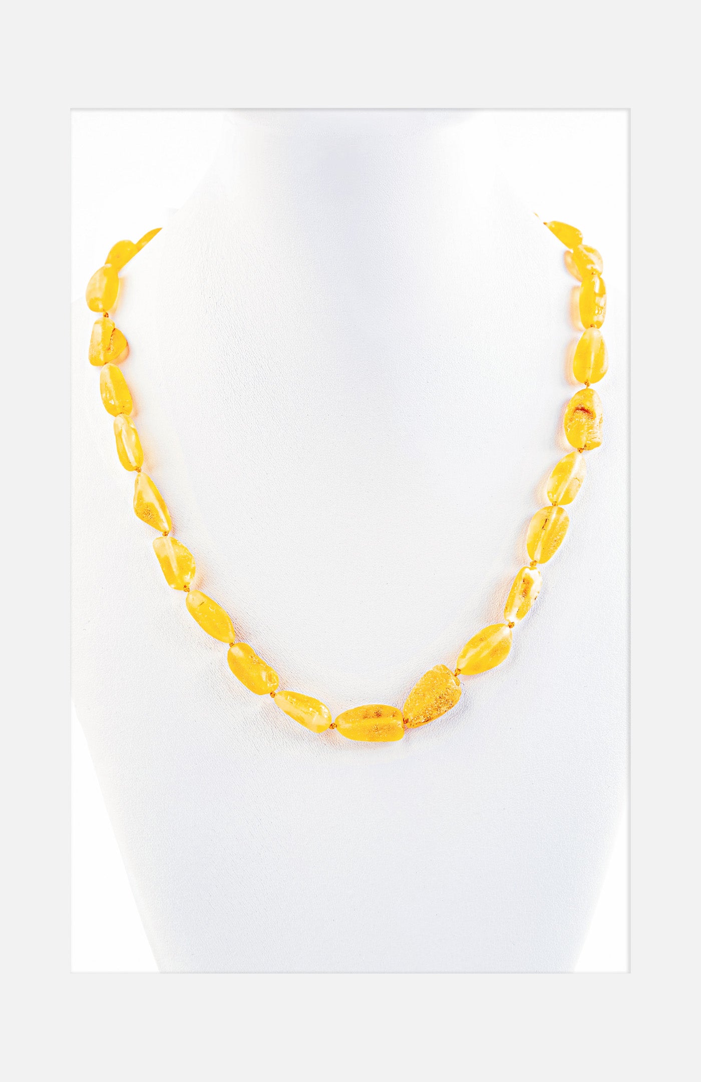 Amber necklace made from naturally lemon yellow amber