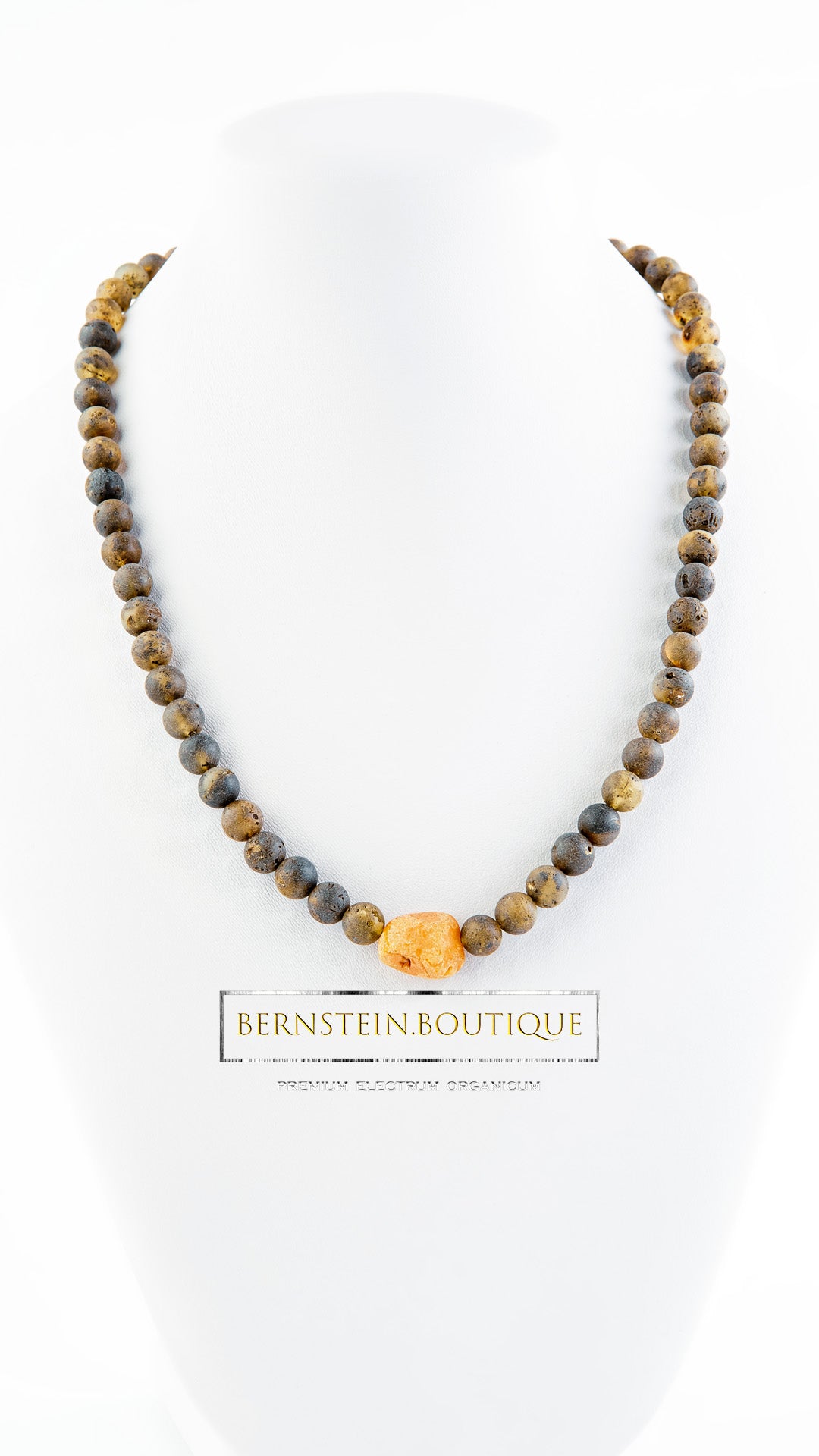 Necklace for All - Made from approximately seventy global amber beads and their amber nugget sun