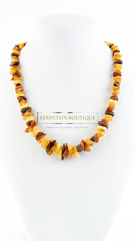 Necklace made of raw, multicolored sorted, unpolished, natural amber chips