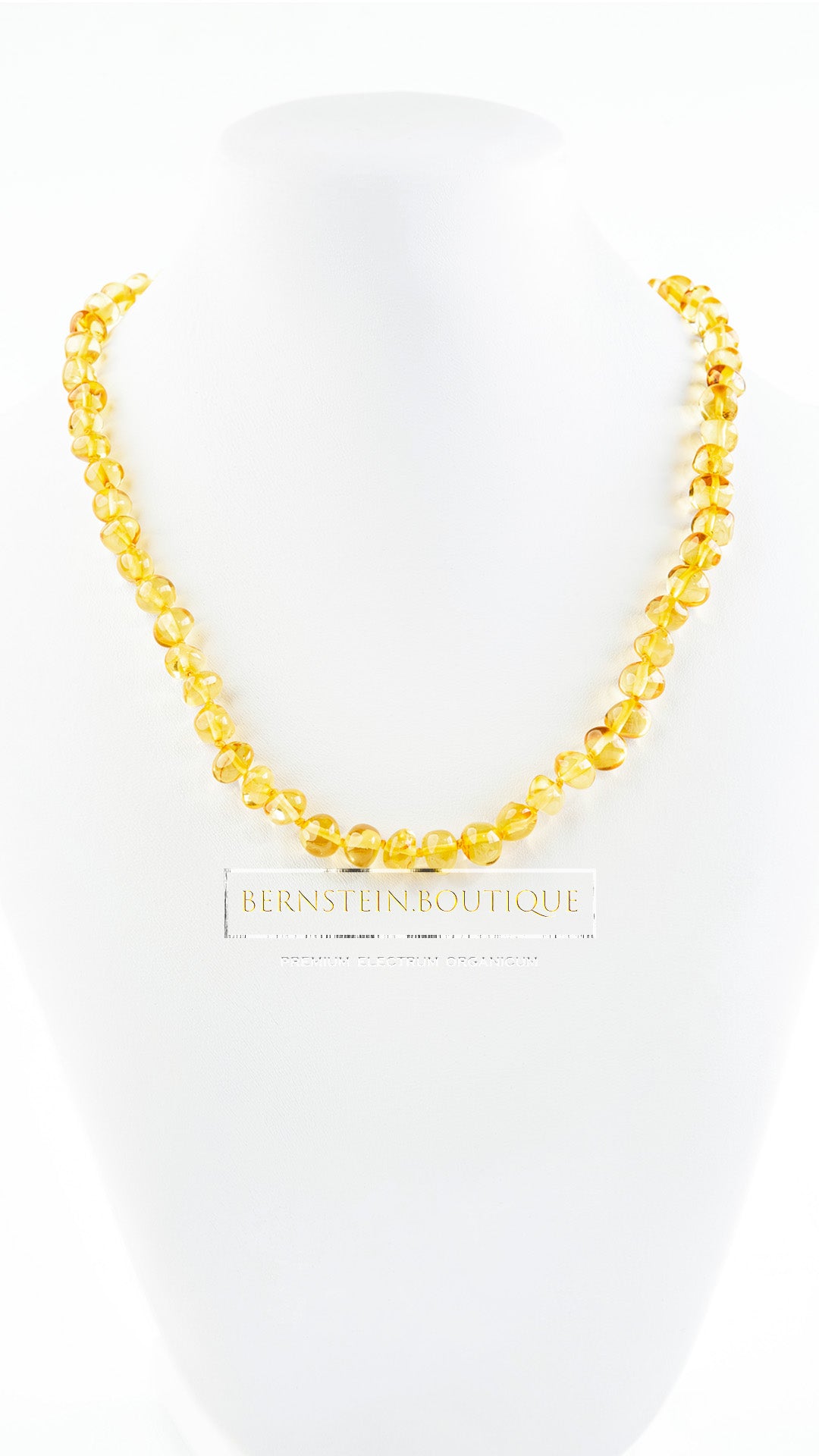 Necklace made of shiny polished small baroque amber beads