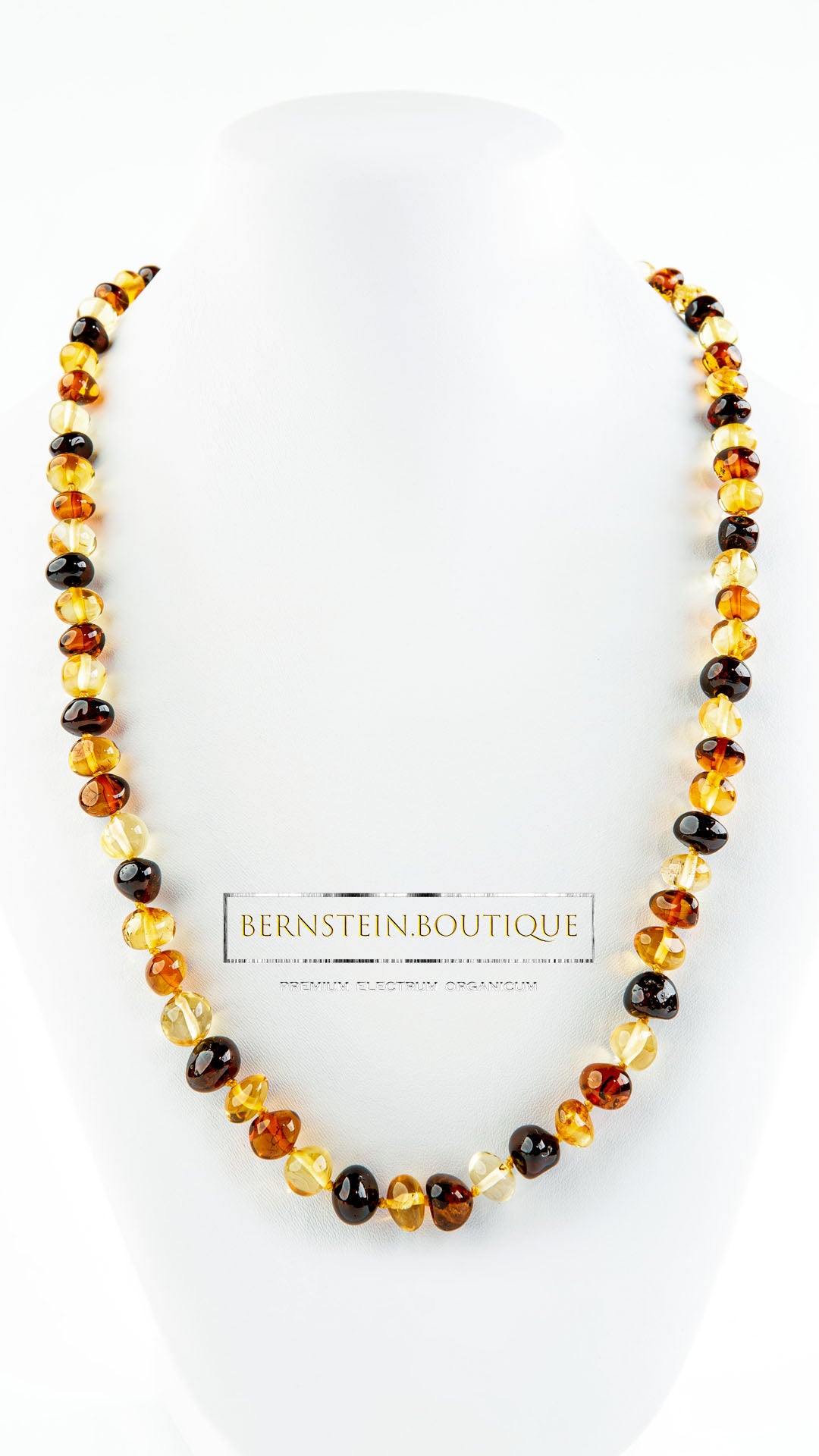 Necklace made of amber beads of three natural amber colors, in baroque shape