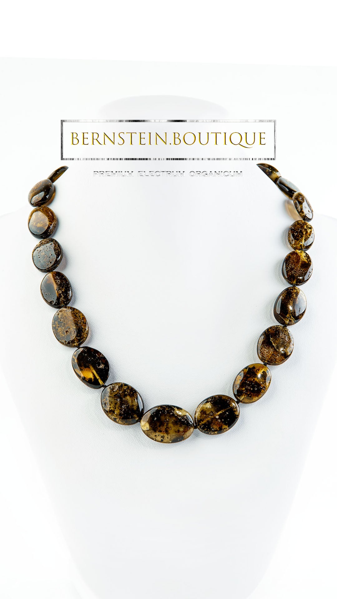 Necklace of highly polished bean-shaped amber beads - with significant inclusions of Eocene moss