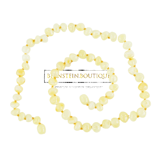 Classic "ivory" necklace made of baroque natural amber beads