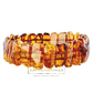 Luxury bracelet made of fine natural amber in the polished Stonehenge noble style