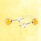 Stud earrings made of two shiny yellow balls made of natural Nordic Amber, ..