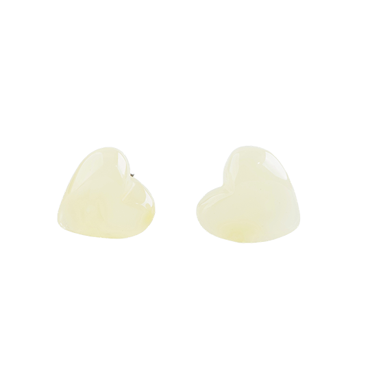 Stud earrings made of amber pearls in a cute silhouette in a natural color around pearl white. .