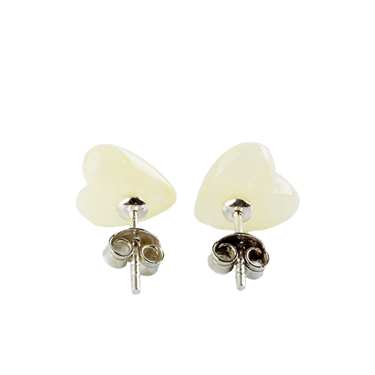 Stud earrings made of amber pearls in a cute silhouette in a natural color around pearl white. .