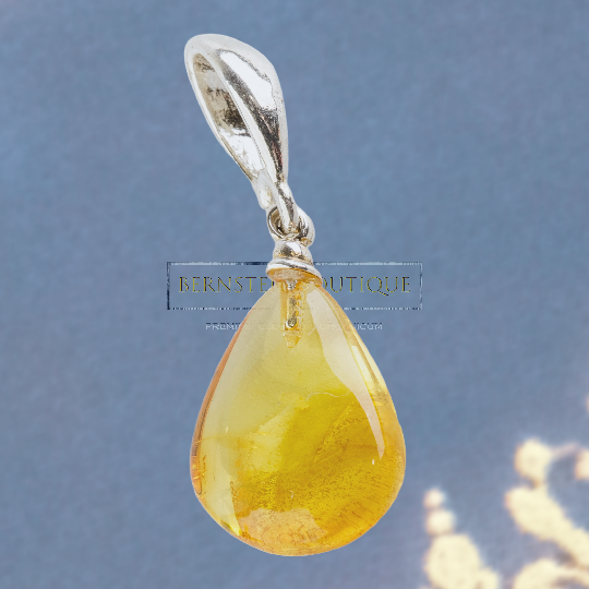 Pendant - A delicate natural amber drop