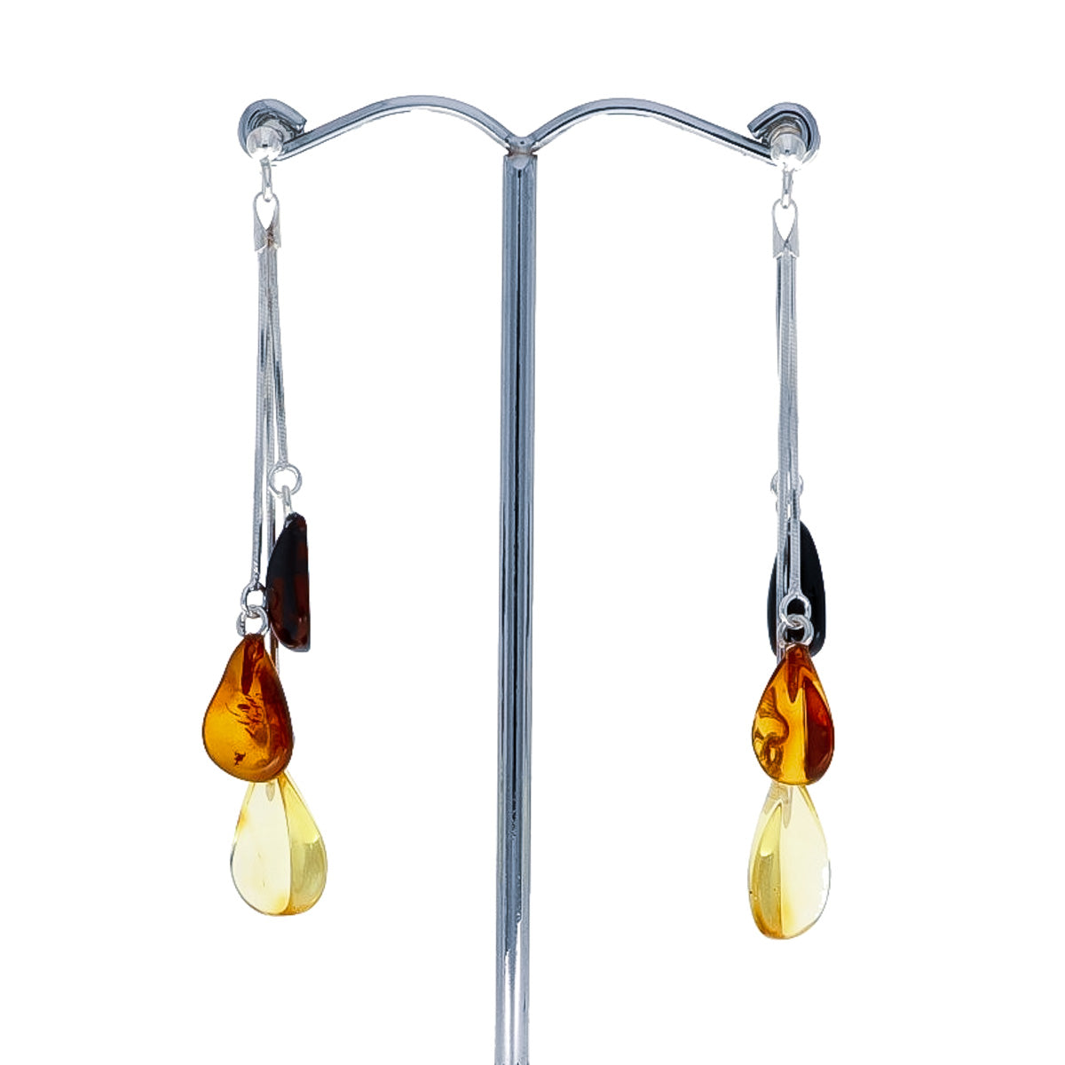 Stud earrings with hanging silver chains, each with three amber beads