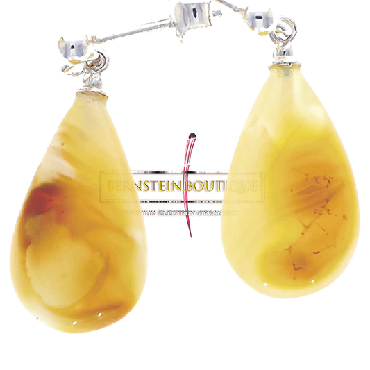 Stud earrings made of "pear beads" from natural amber on sterling silver