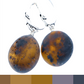 Earrings made of amber beads, slightly velvety cut and unpolished