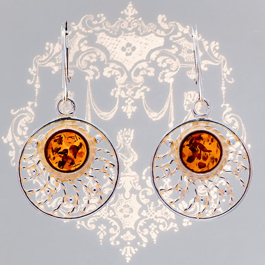 Sunny earrings with a central celestial amber bead set in sterling silver