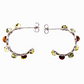 Classic, arch-shaped stud earrings made of sterling silver with seven amber beads each