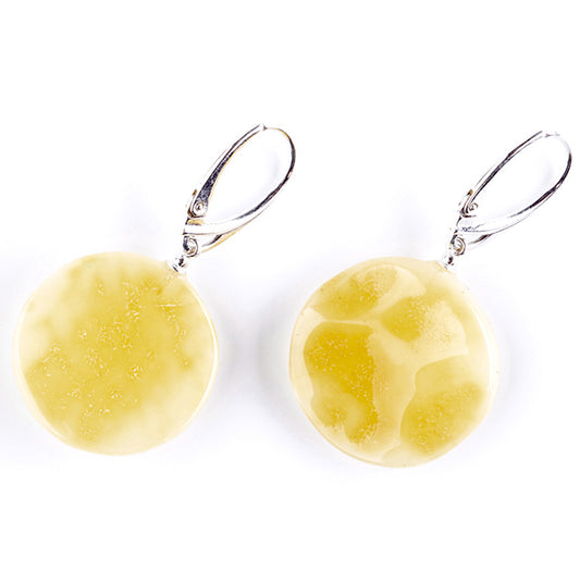 Amber - earrings in yellow to milky color, in disc shape