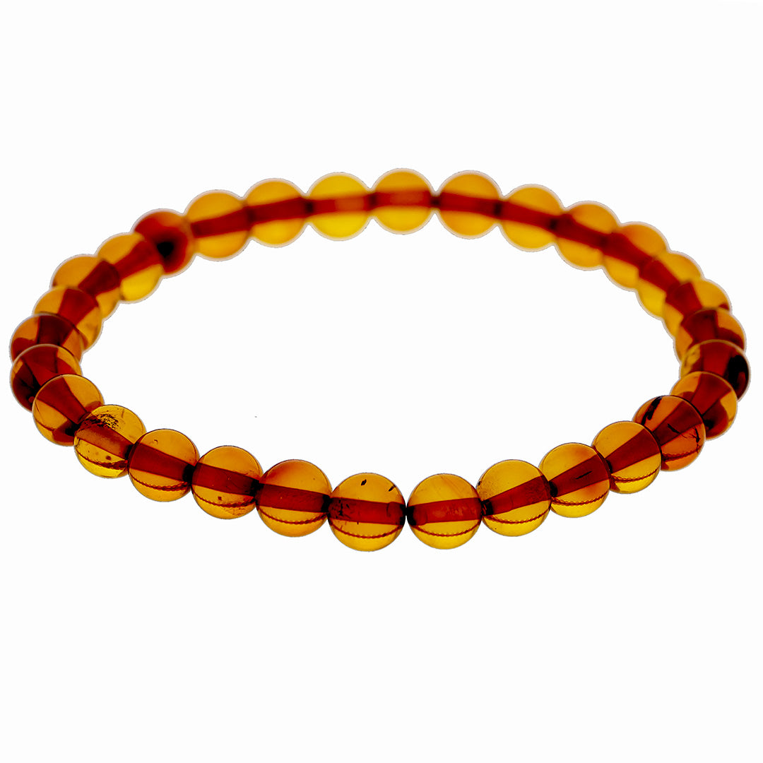 Bracelet made of amber beads - brownish, transparent