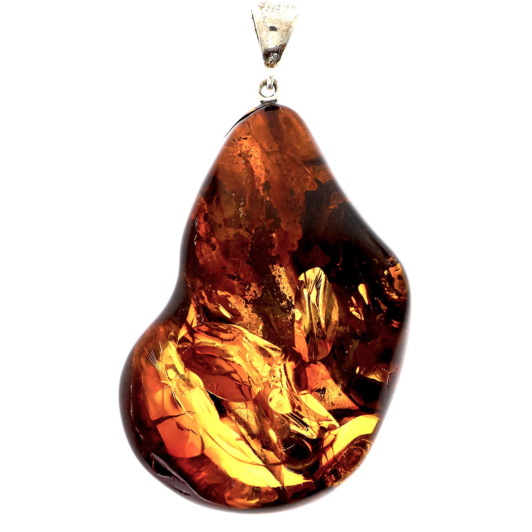 Round pendant made of real amber