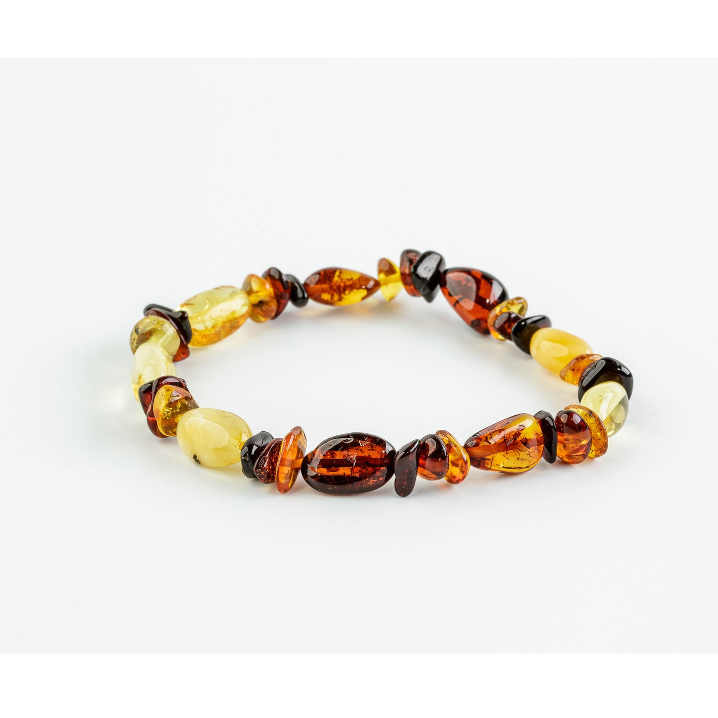 Filigree original bracelet made of amber, in natural "tricolore"