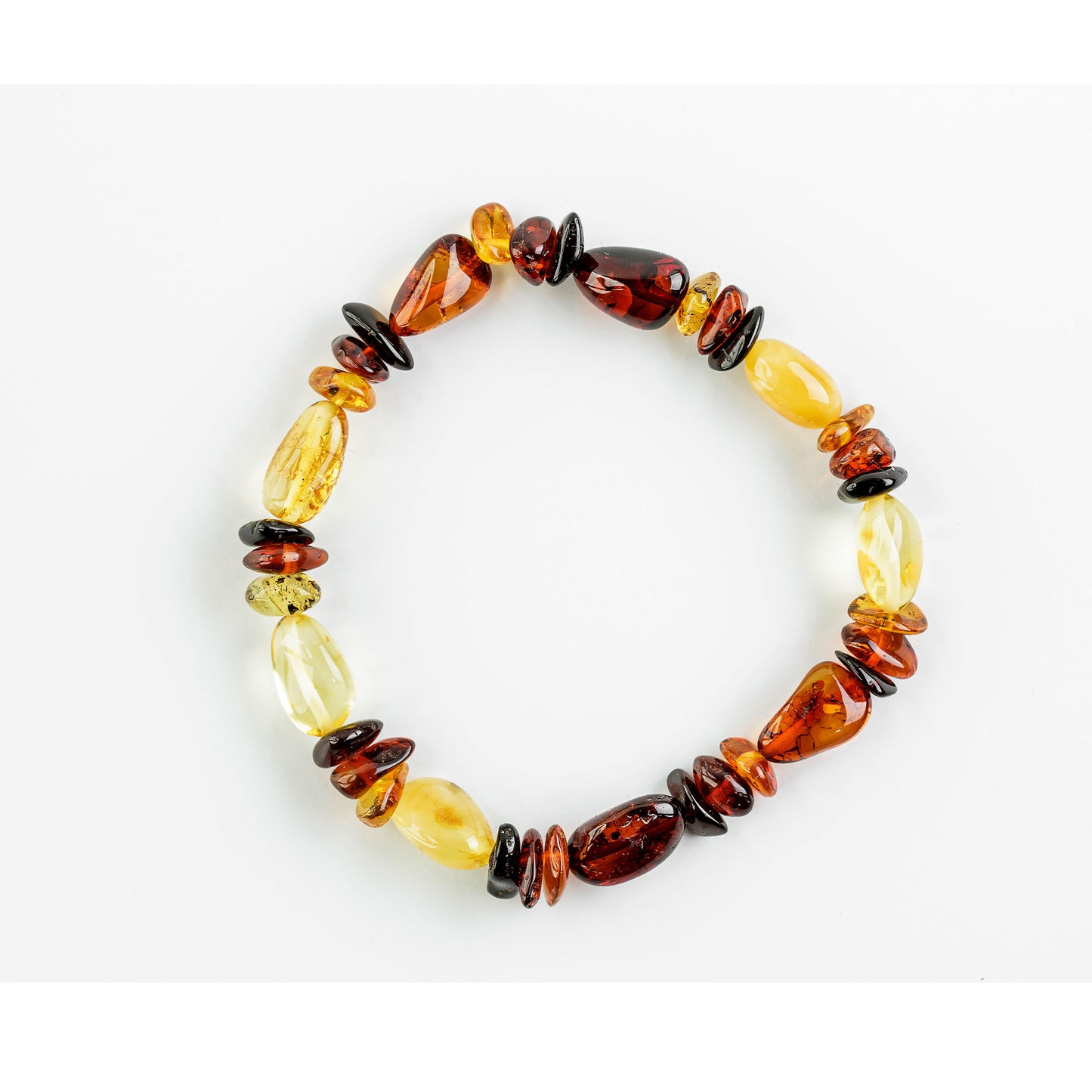 Filigree original bracelet made of amber, in natural "tricolore"