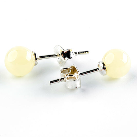 Ball bead stud earrings in amber and sterling silver